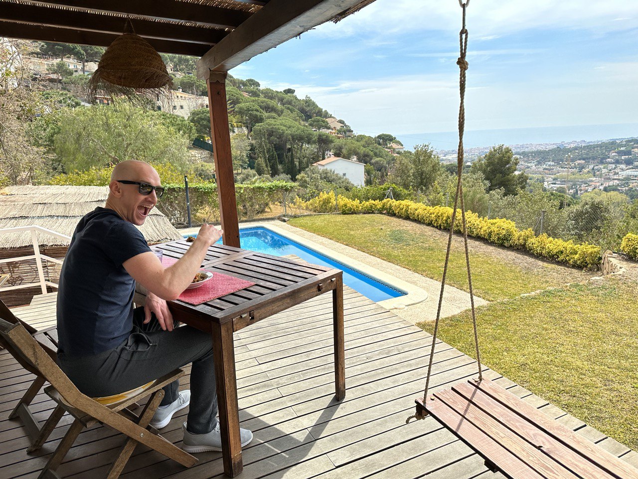 Photo of me on the deck of a nice Airbnb a little north of Barcelona.